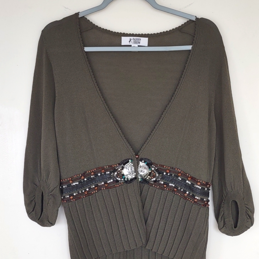 Cardigan with runestone and beads